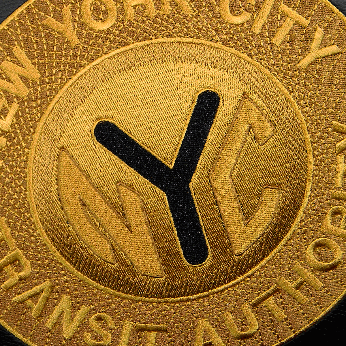 Emb-General_0002_NYC-Subway-Token
